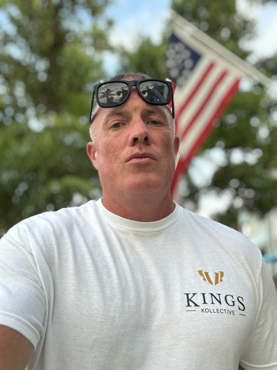 BJ Barrett wearing a white Kings Kollective shirt